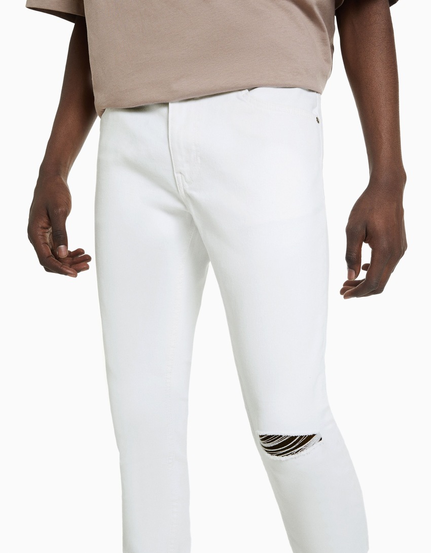 calças jeans super skinny