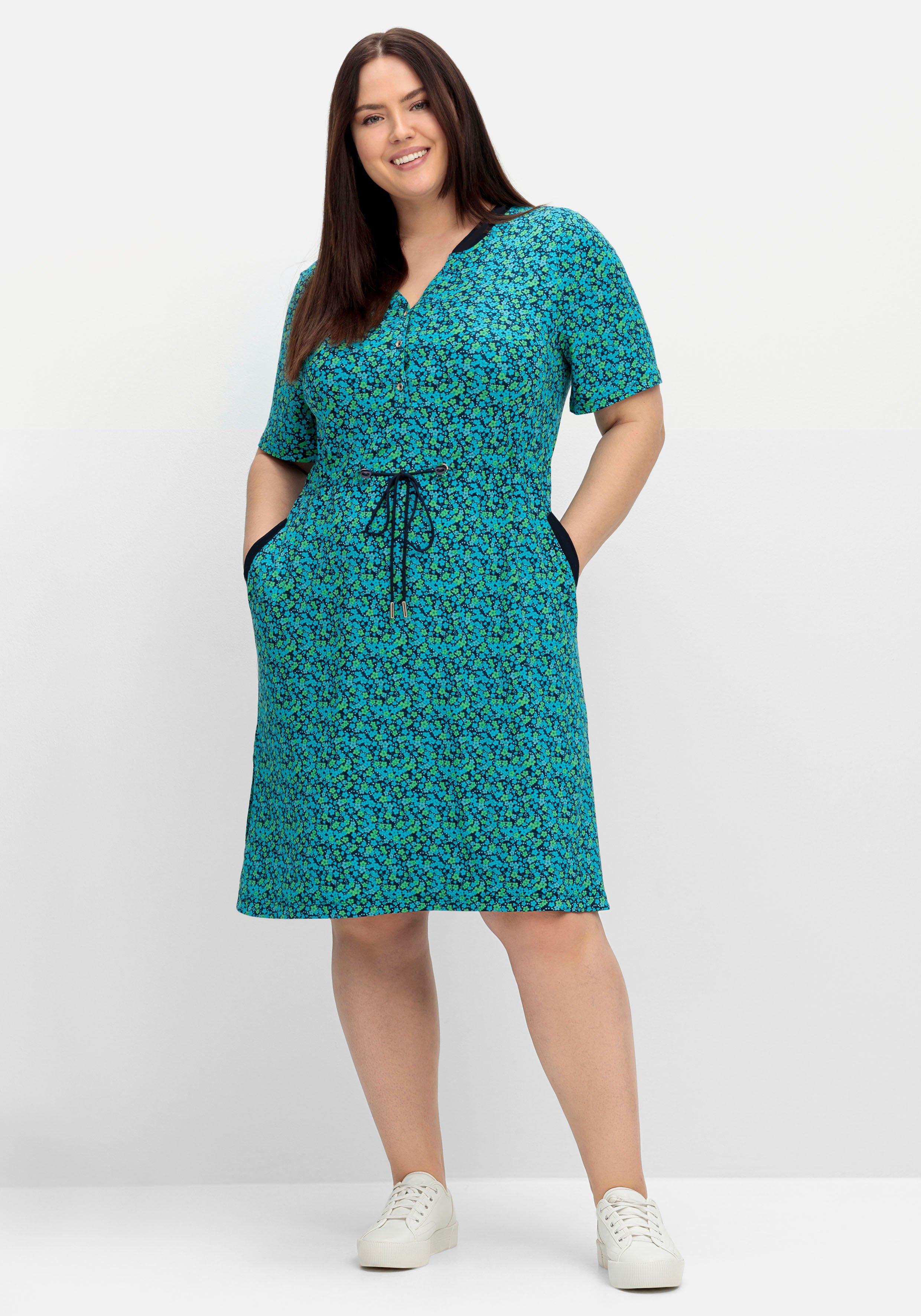 Jerseykleid mit Alloverdruck und sportiven Details