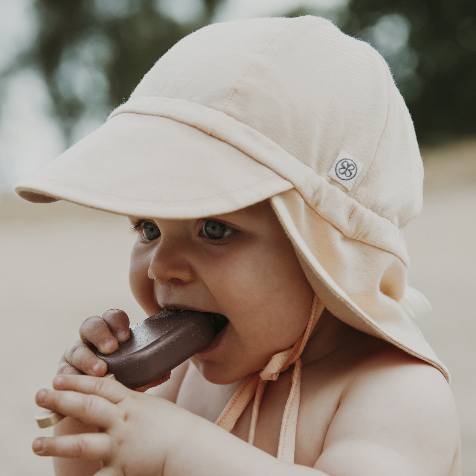 Baby Sonnenhut UVP 50  Peachy Summer Sandy Beach