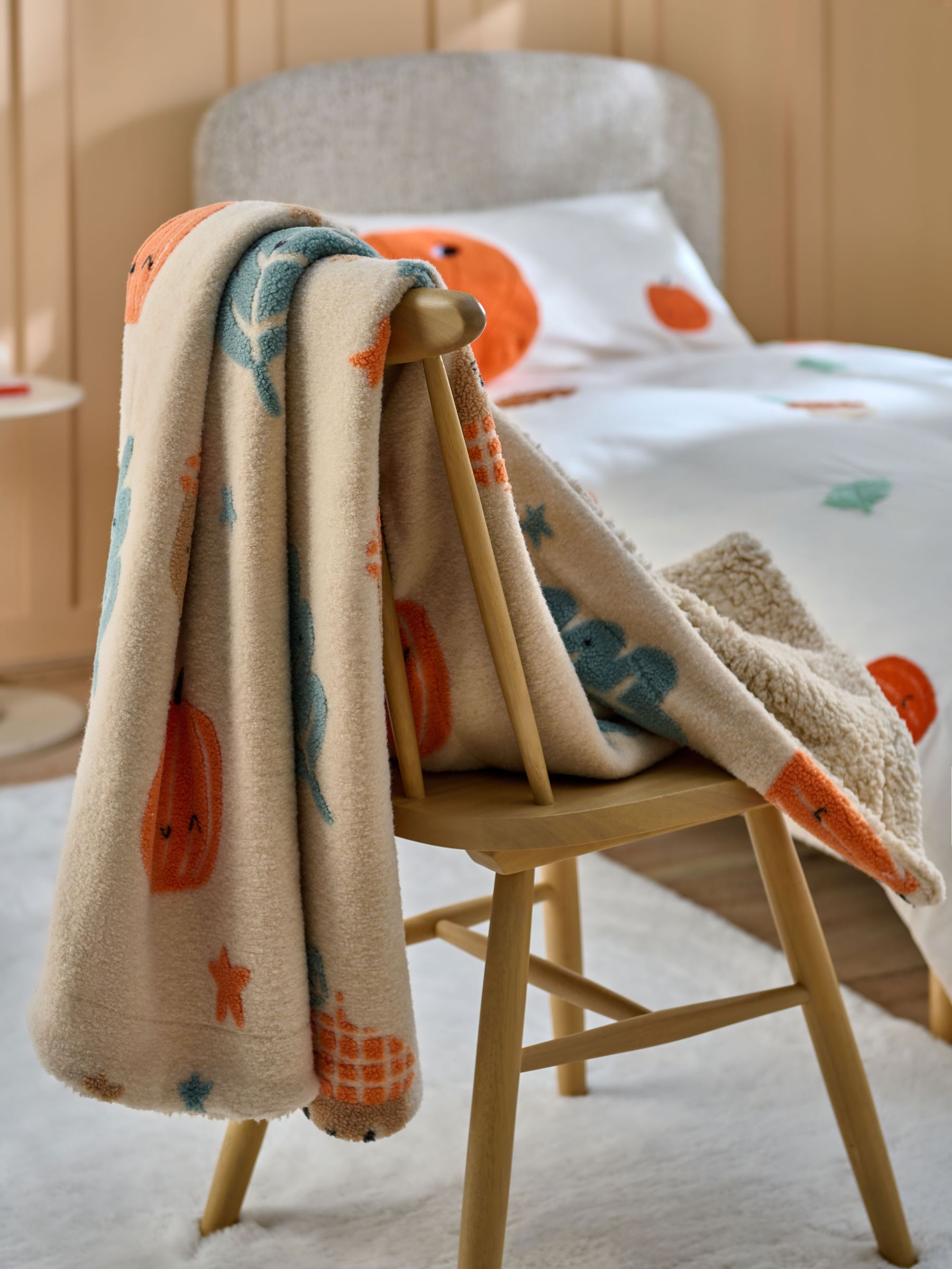 Fleece bedloper met pompoenprint