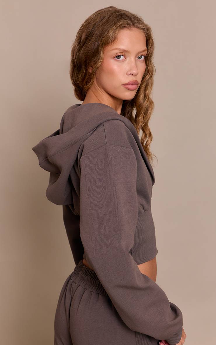 Charbon Sweat À Casynthétiqueche Zippé Avec Taille Cintrée En Interlock Brodé