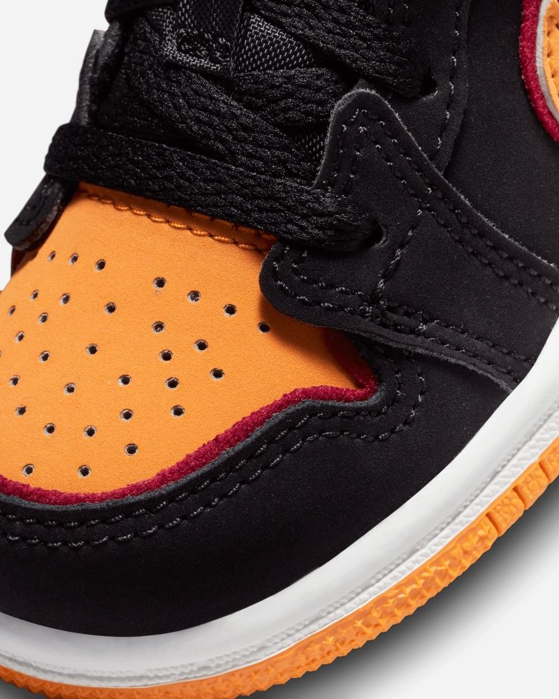 Chaussures Nike Air Jordan 1 Low SE Noir & Orange pour enfant