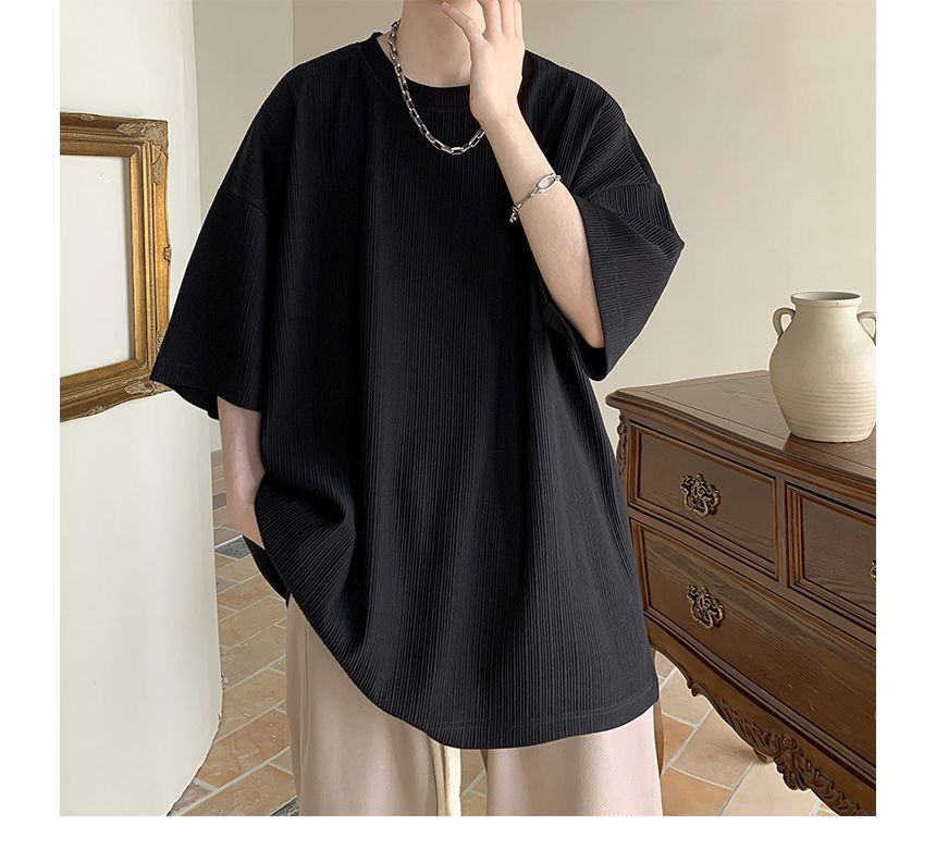 Nightbell - Effen oversized T-shirt met ronde hals en elleboogmouwen