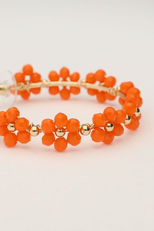Grote oorringen met oranje bloemetjes