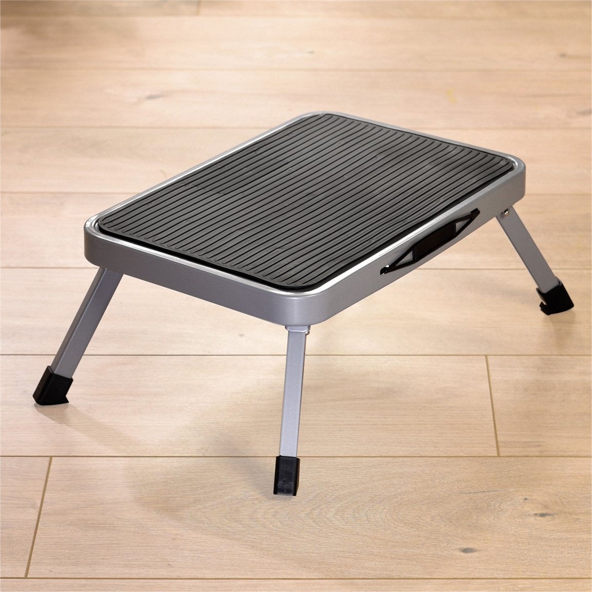 Marche pied pliable