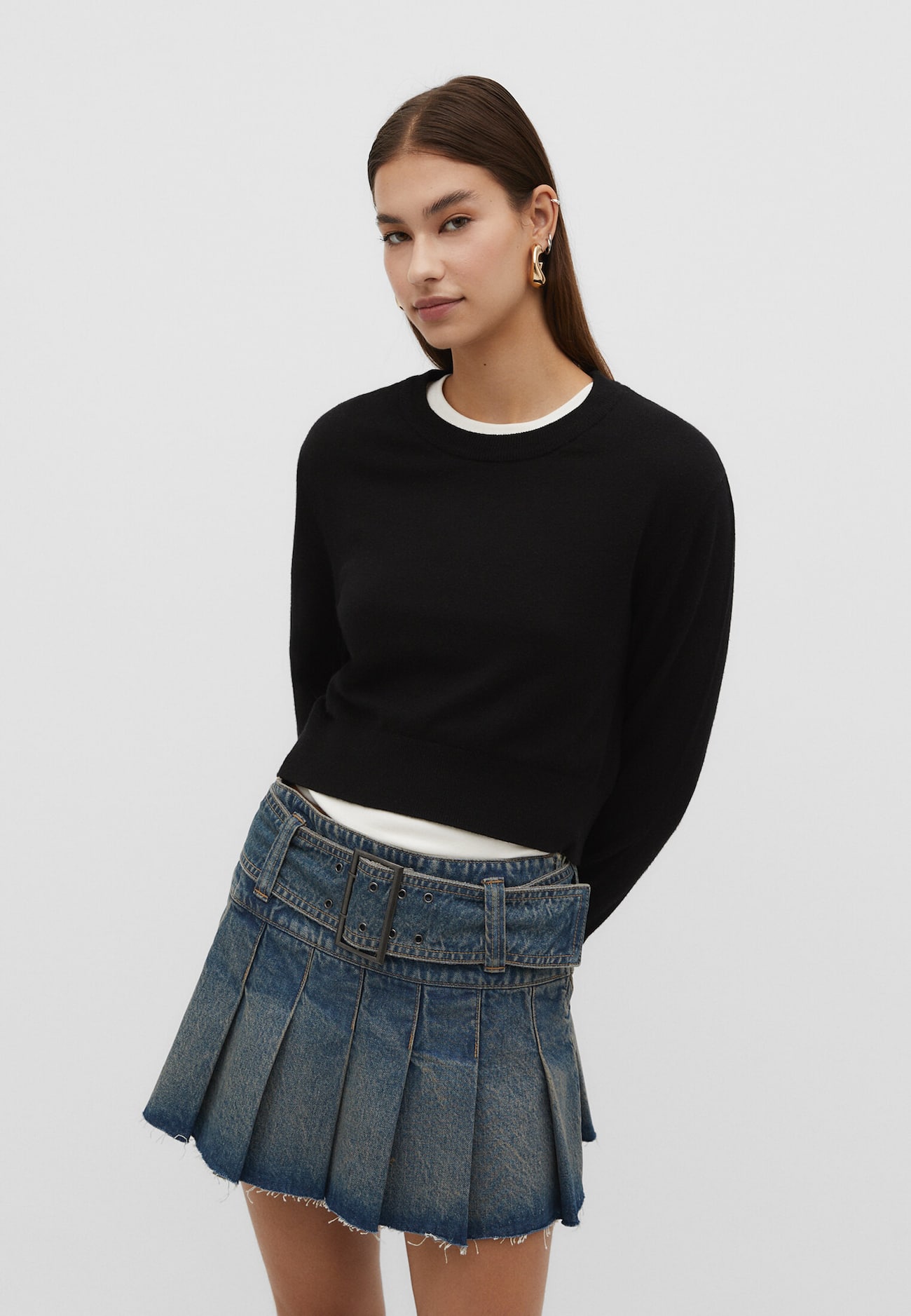 Minissaia jeans com pregas caixa