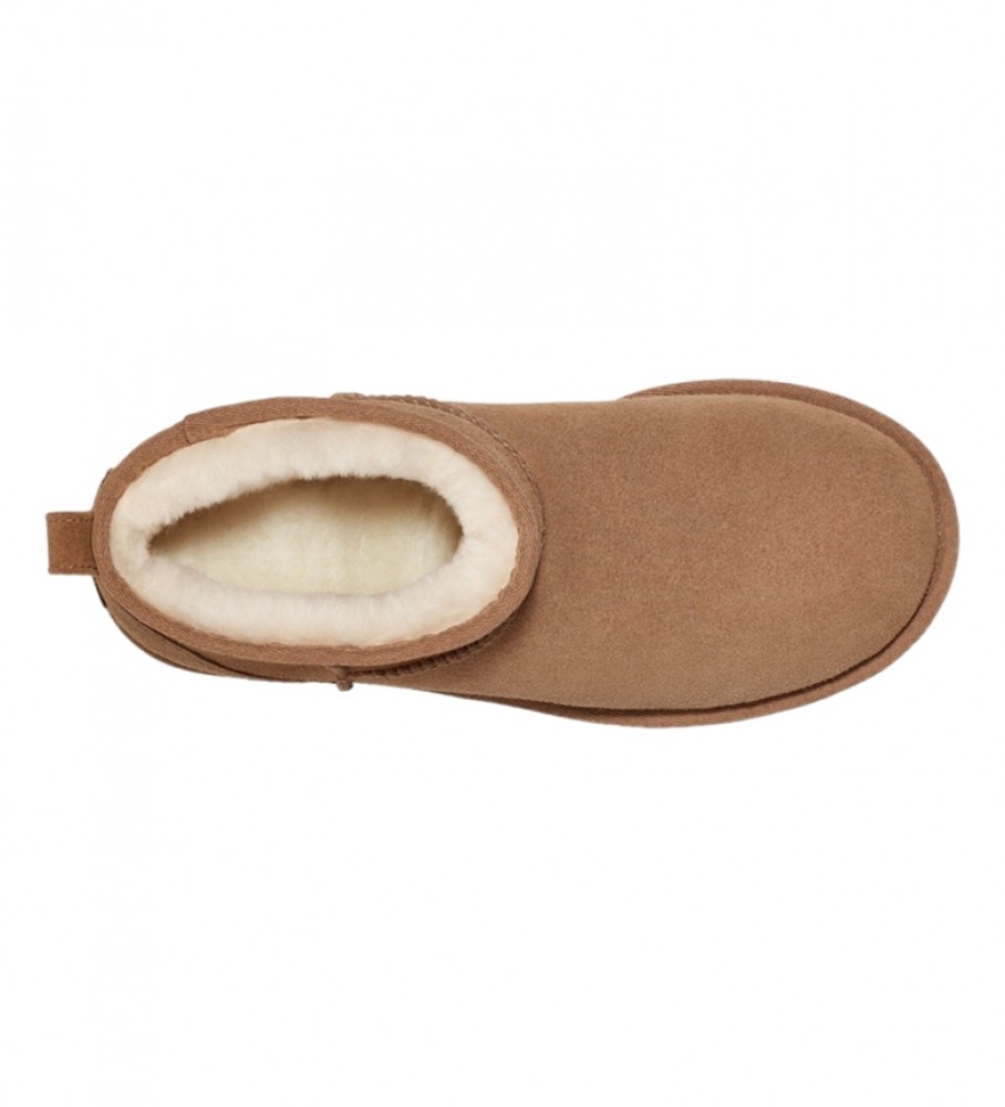Botas de cano curto UGG em couro marrom, modelo Classic Ultra Mini Platform - Altura da plataforma: 5 cm -