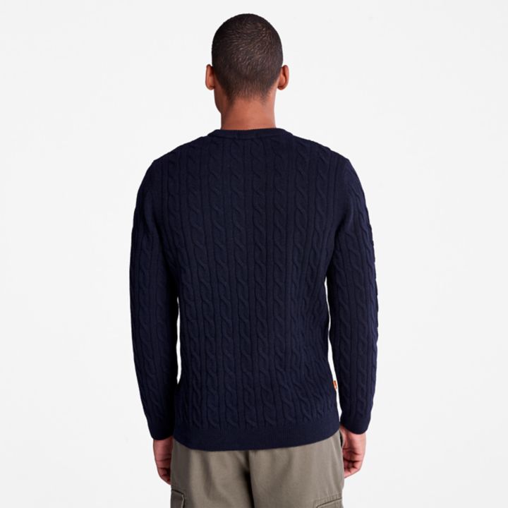 Suéter Phillips Brook de malha trançada para homens na cor azul marinho.