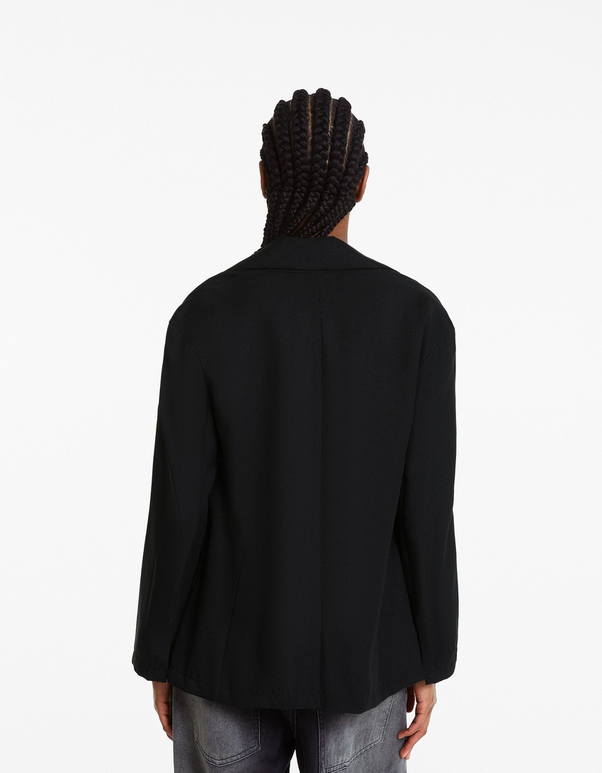 Blazer fluido de corte feminino