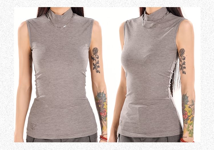 KUMI - Slim fit tanktop met opstaande kraag en vlinderborduursel