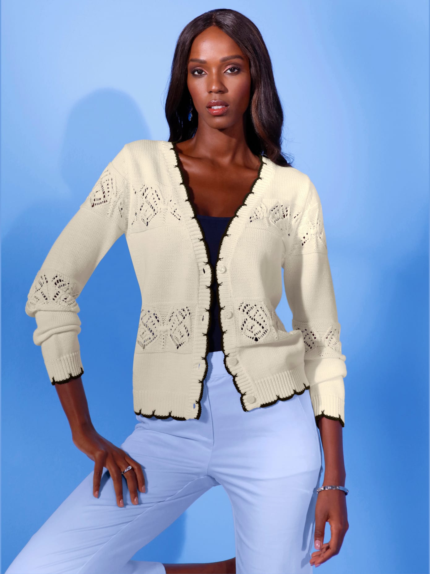 Veste en tricot avec motif ajouré