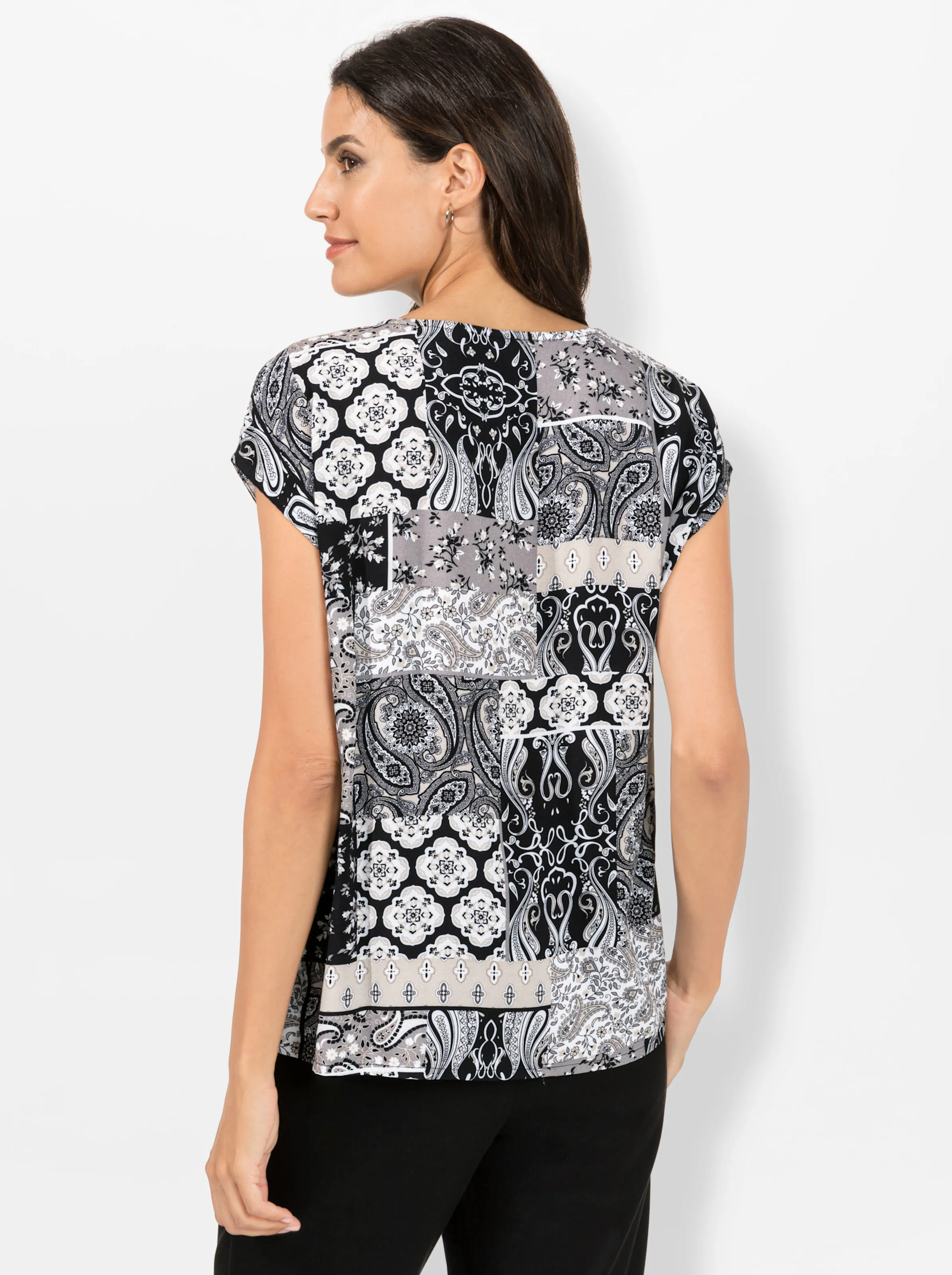 Druckbluse in schwarz-sand-bedruckt