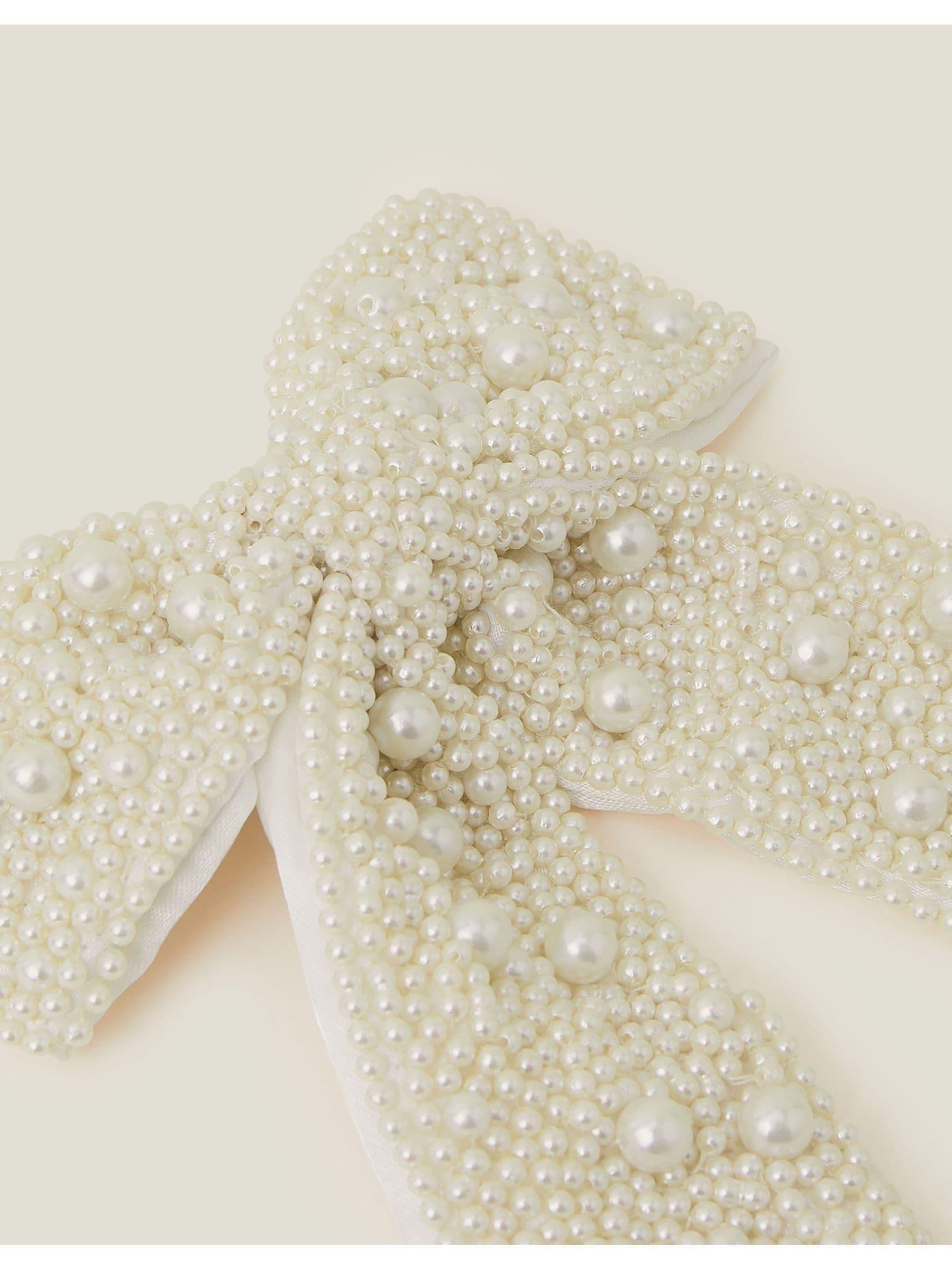 Accessorize - Opvallende haarstrik met parels