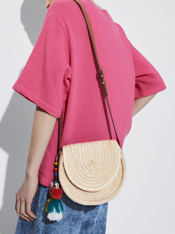 Bolsa transversal com pompons - Bege