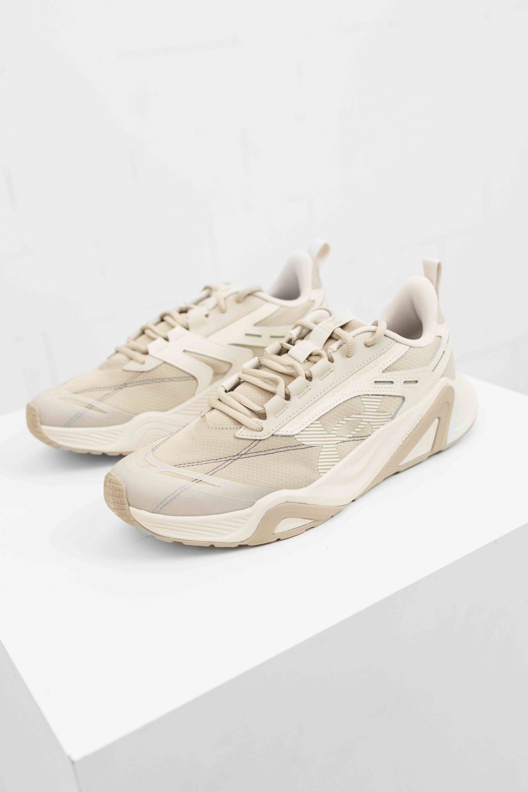 Under Armour Charged Commit TR 5 Sneakers Heren Beige