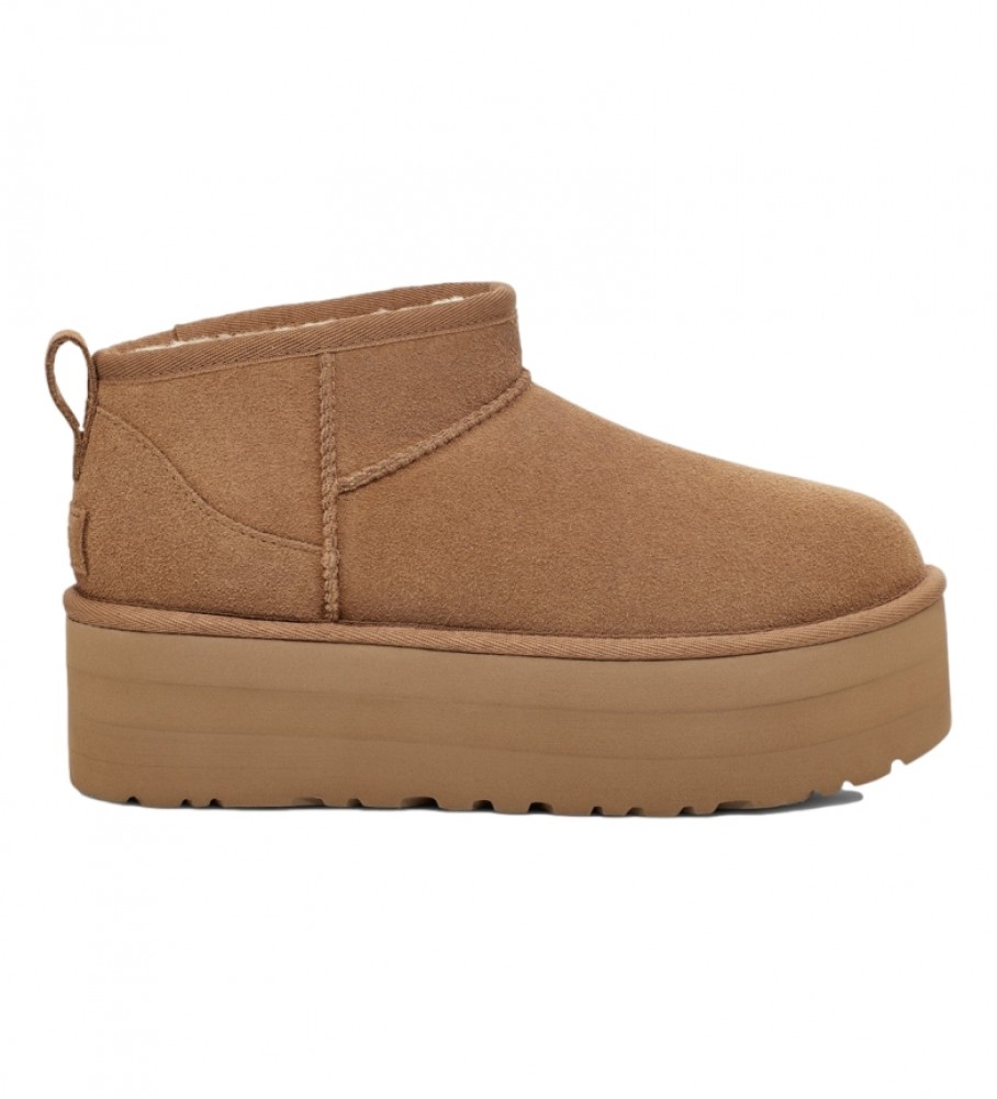 Botas de cano curto UGG em couro marrom, modelo Classic Ultra Mini Platform - Altura da plataforma: 5 cm -
