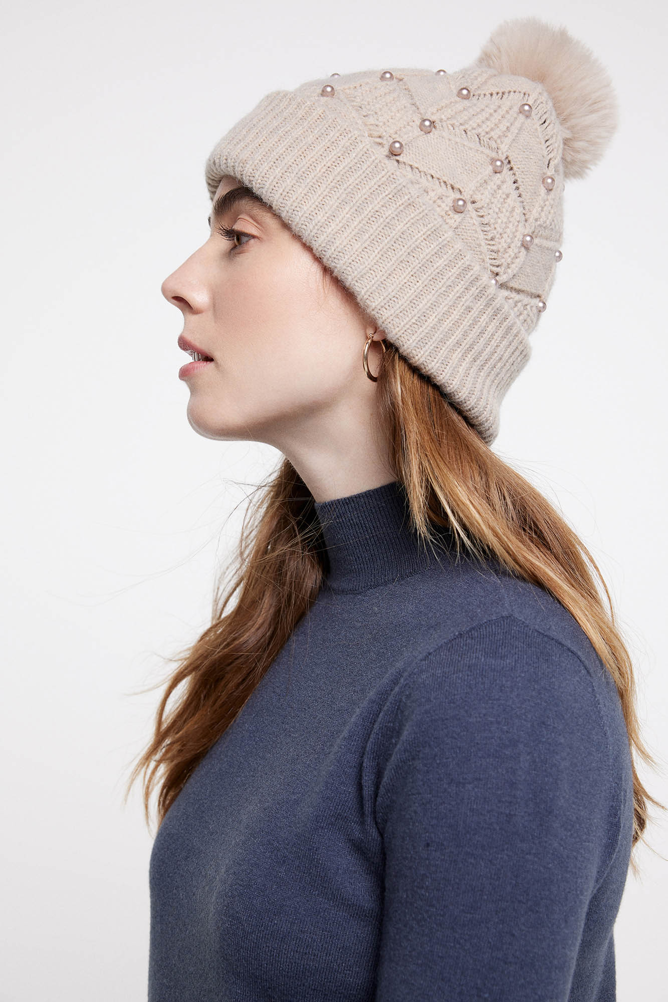 Gorro de tricô com pompom