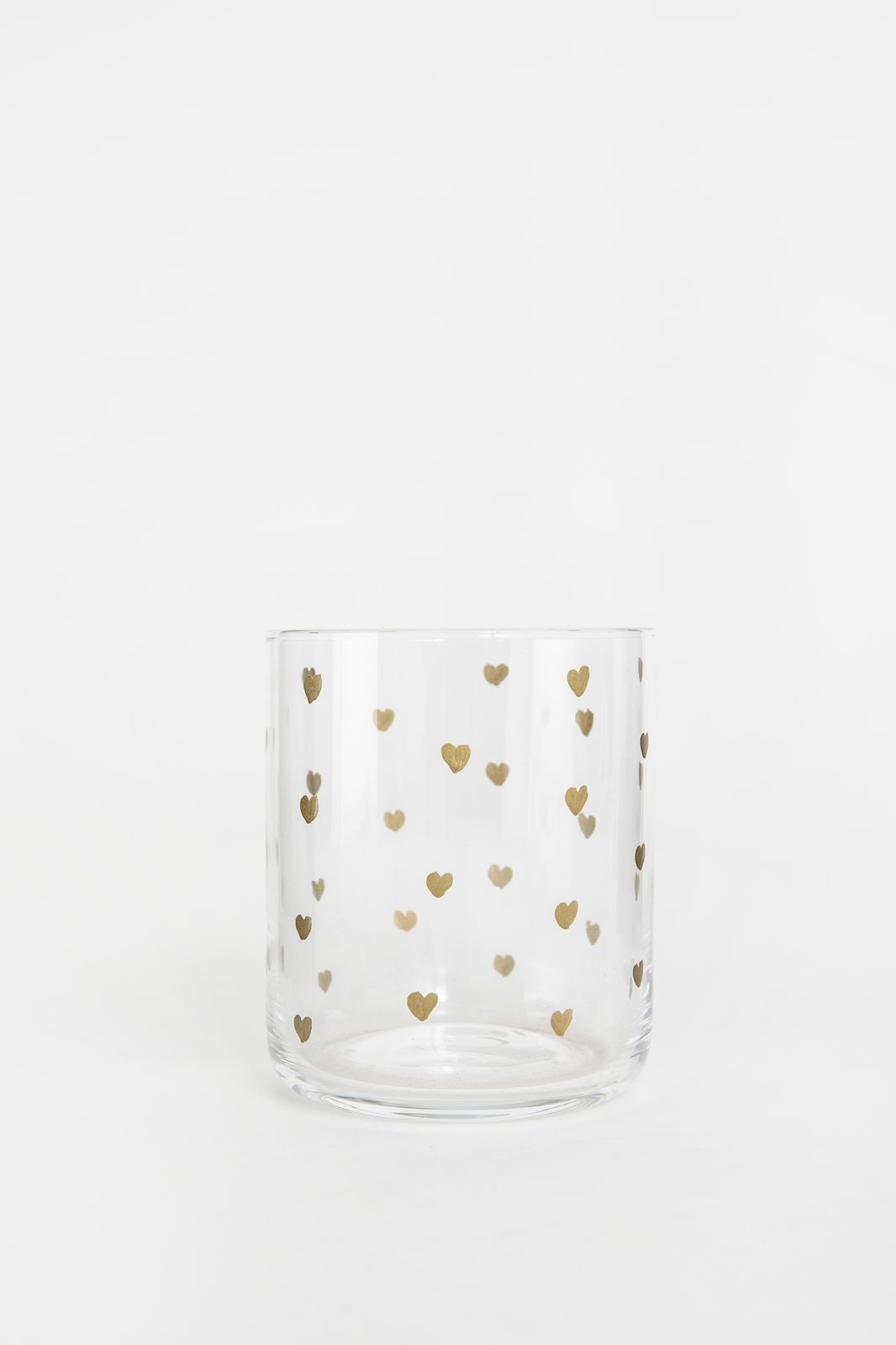 Waterglazen met gouden hartjes