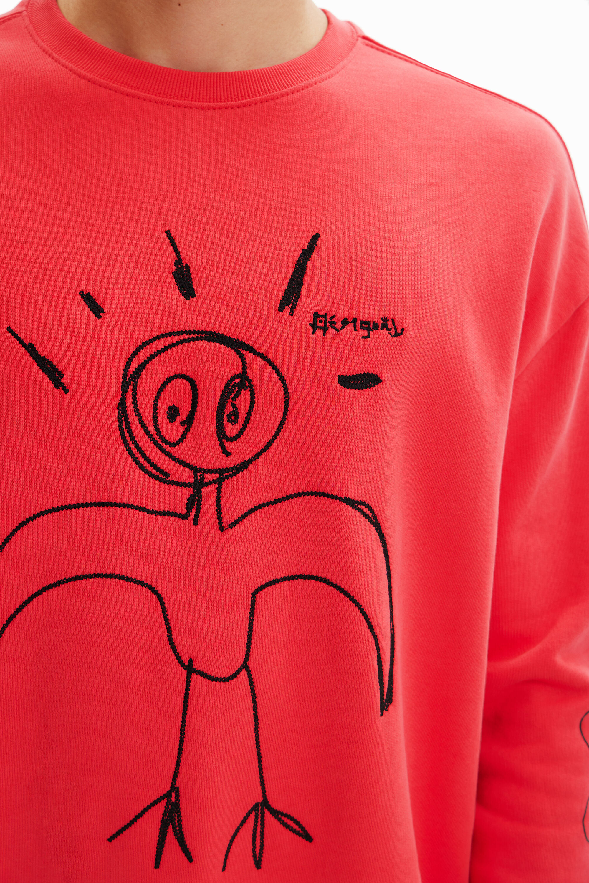 Sweat-shirt oiseau brodé
