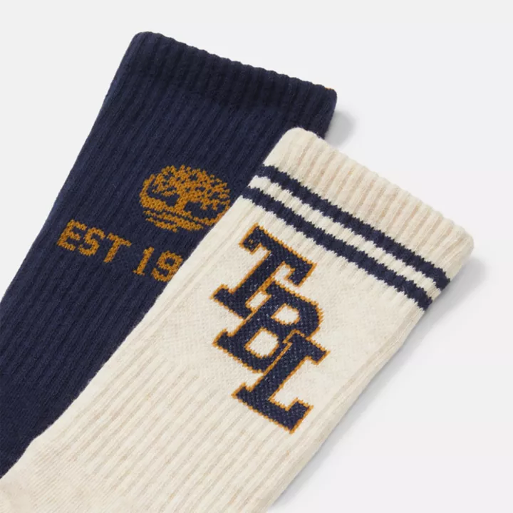 Conjunto de 2 pares de meias retrô unissex com trava, nas cores azul-marinho e bege.