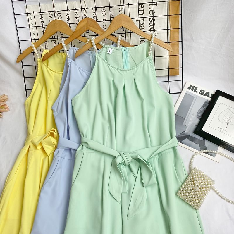 Iasia - Spaghettibandjes jumpsuit met wijde pijpen en strikceintuur