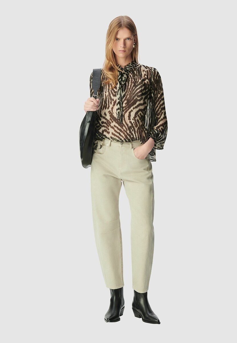 Blusa de manga comprida IKKS com estampa de zebra e laço no pescoço.