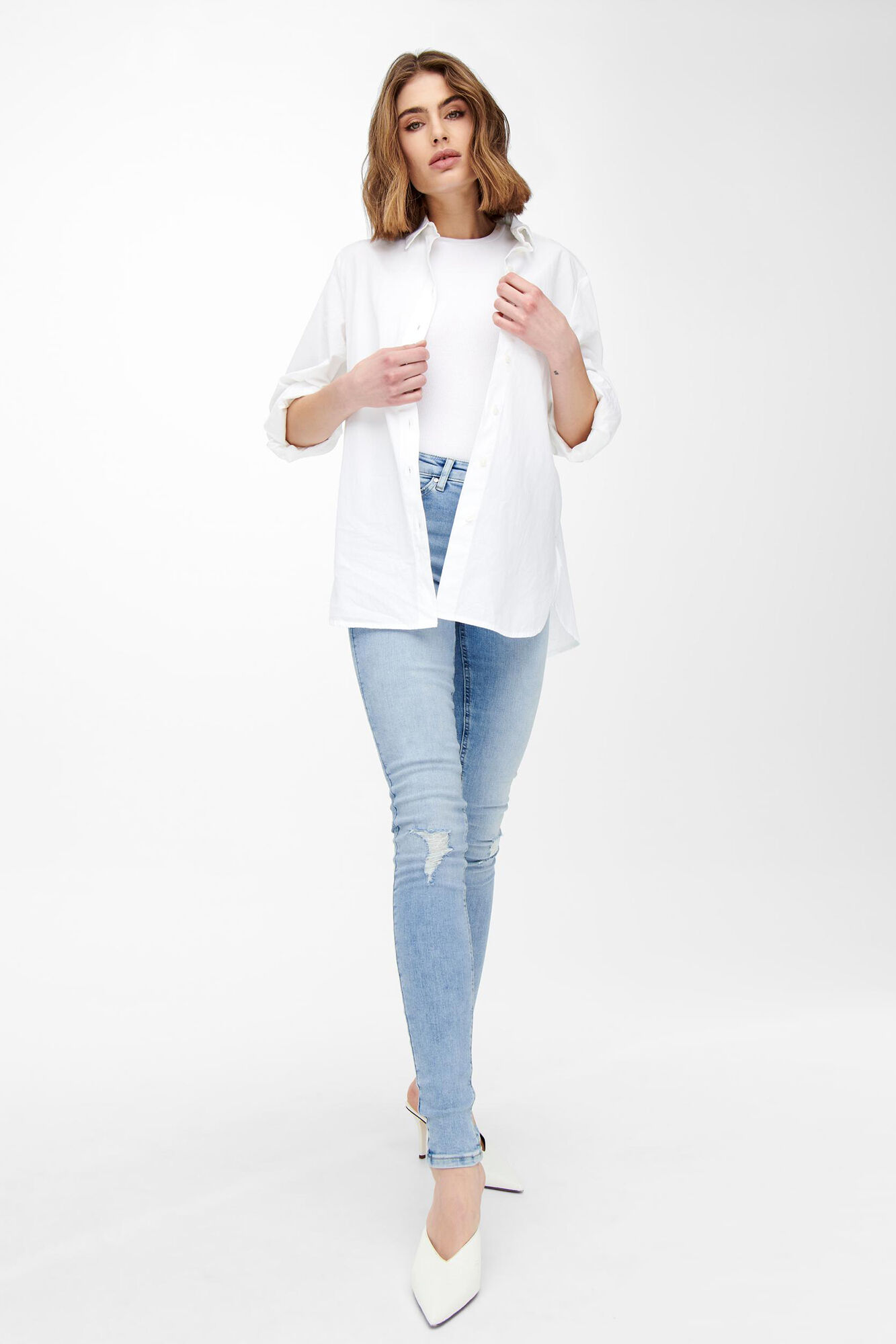 Calça jeans skinny e cintura média