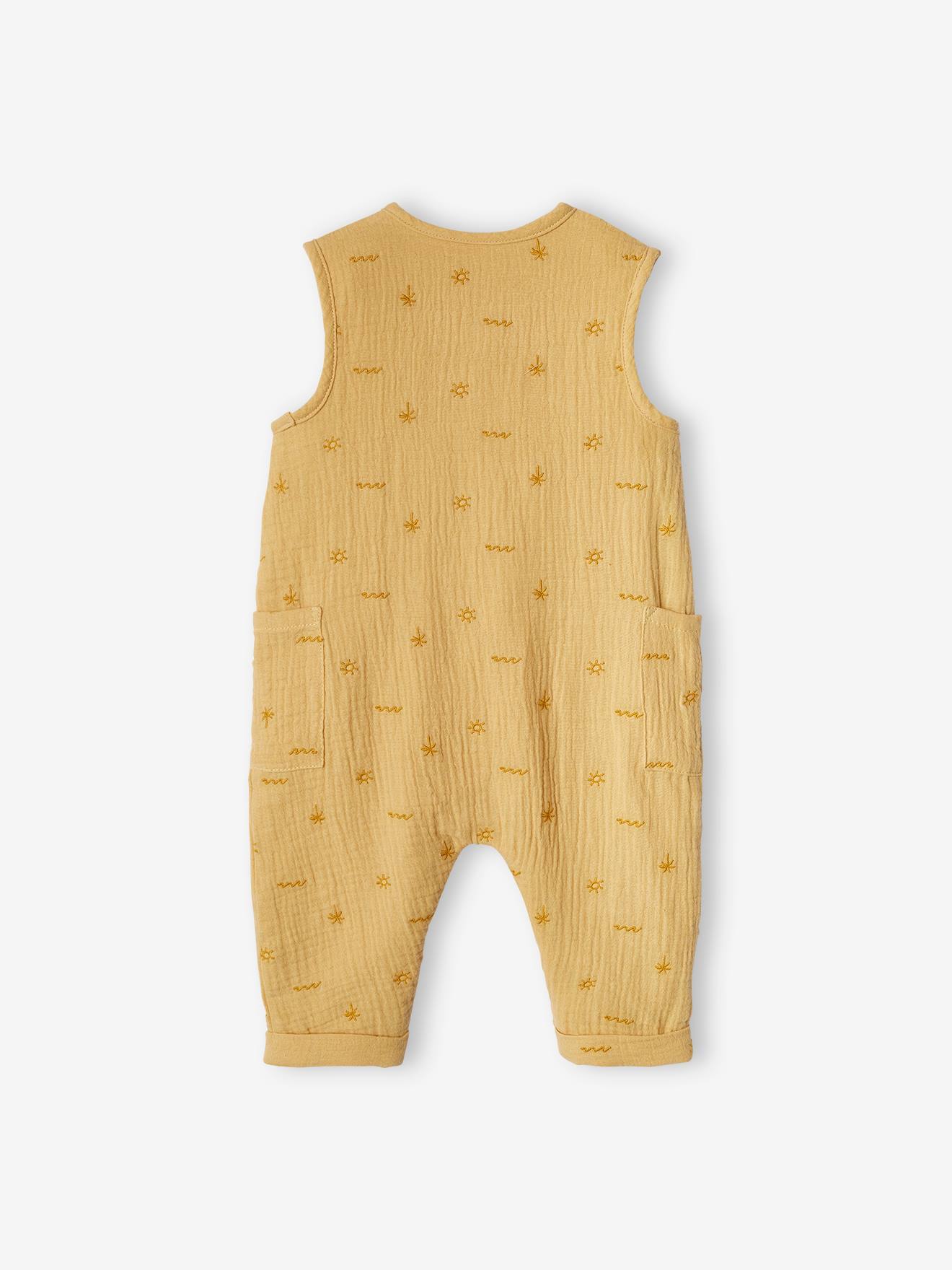 Macacão amarelo claro bordado em chiffon de algodão para recém-nascido.