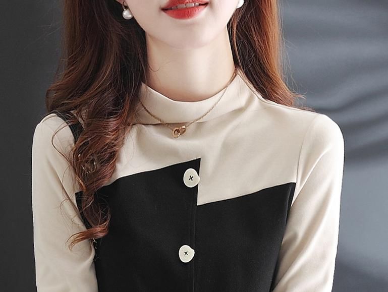 Jeonseon - Blouse met lange mouwen en mockneck en tweekleurige knopen