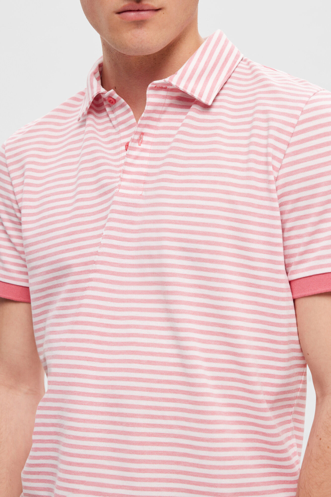 Camisa polo listrada de manga curta em algodão orgânico. - Vermelha