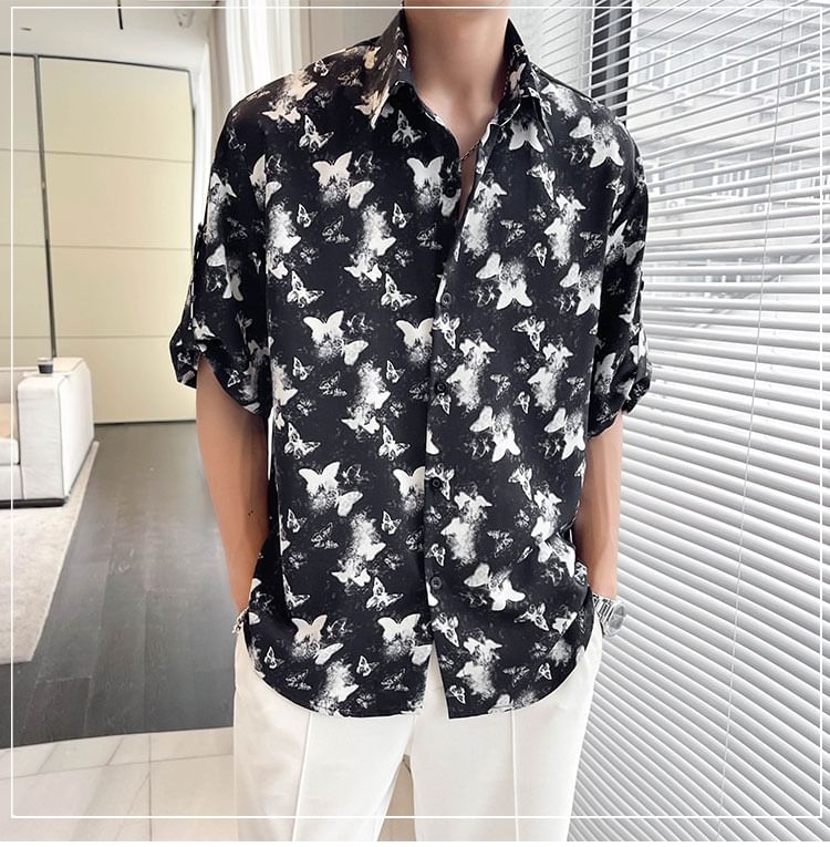 Orungeetun - Elleboogmouw vlinderprint shirt