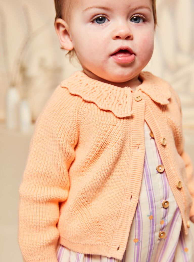 Gilet orange clémentine en tricot à manches longues