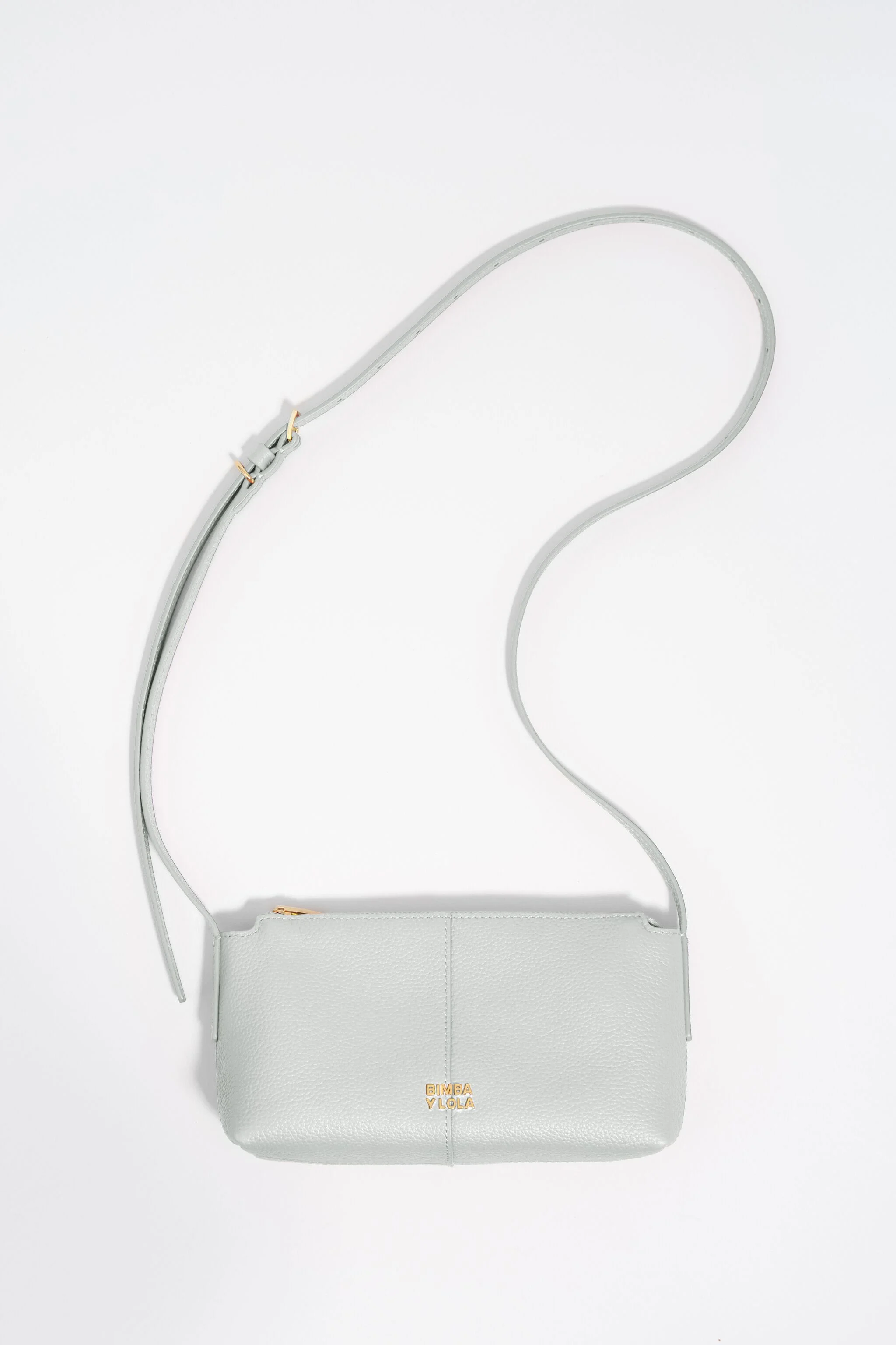 Bolsa transversal mini em couro branco pedra