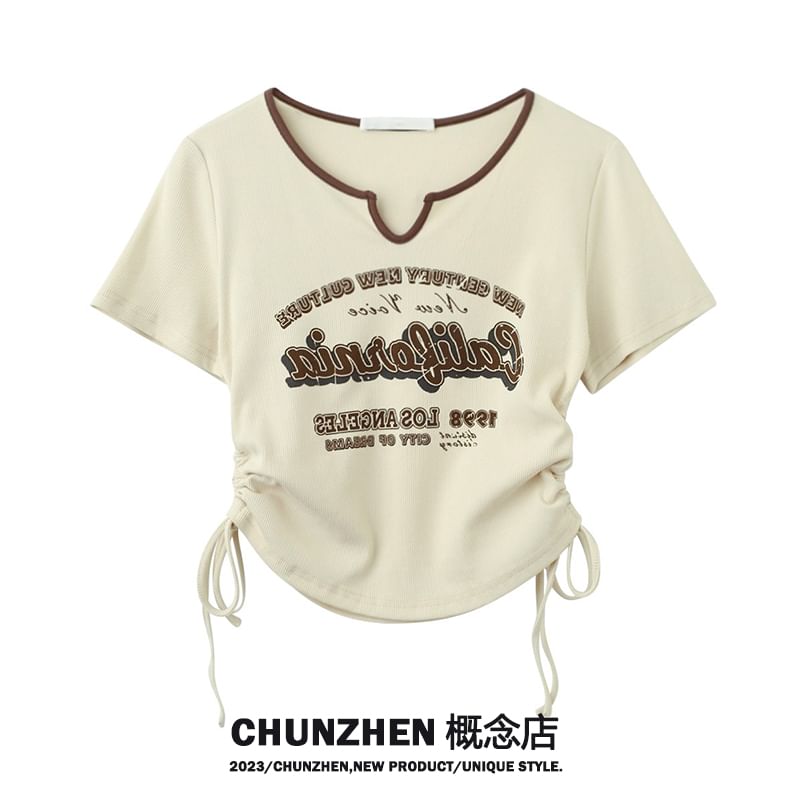 Fatankora - T-shirt met korte mouwen, inkeping in de halslijn en letters