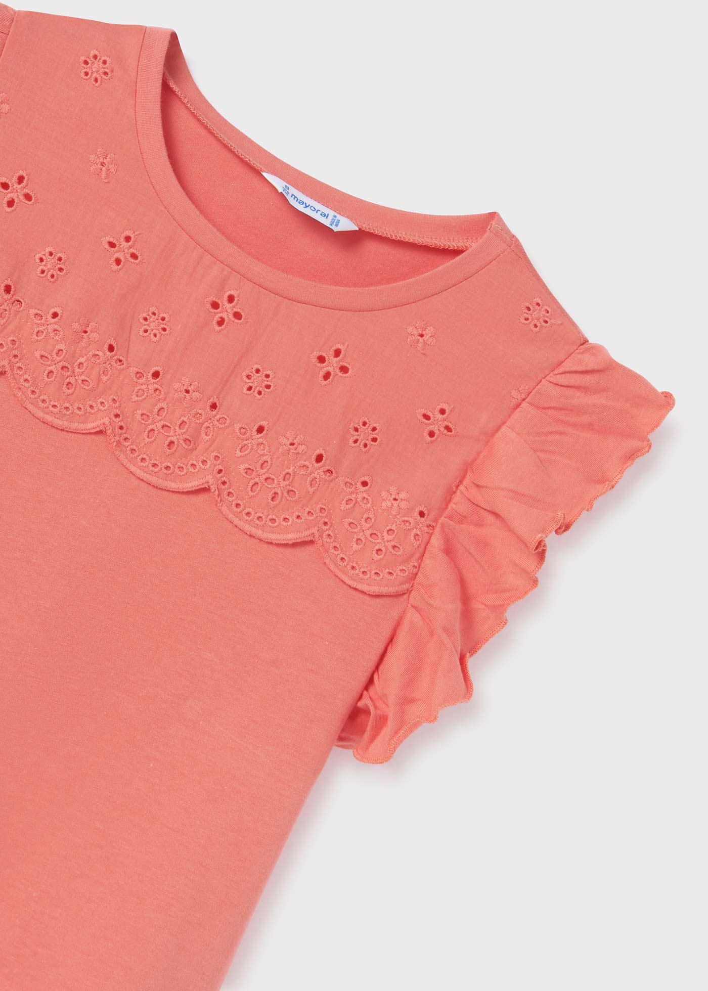 Camiseta regata feminina com babados, feita de algodão sustentável.
