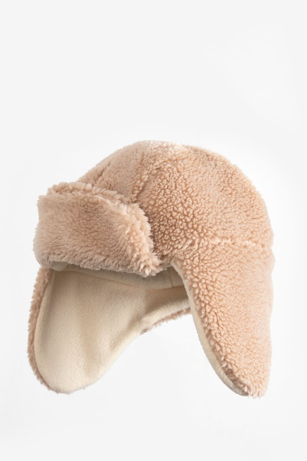 Beige teddy pilotenmuts