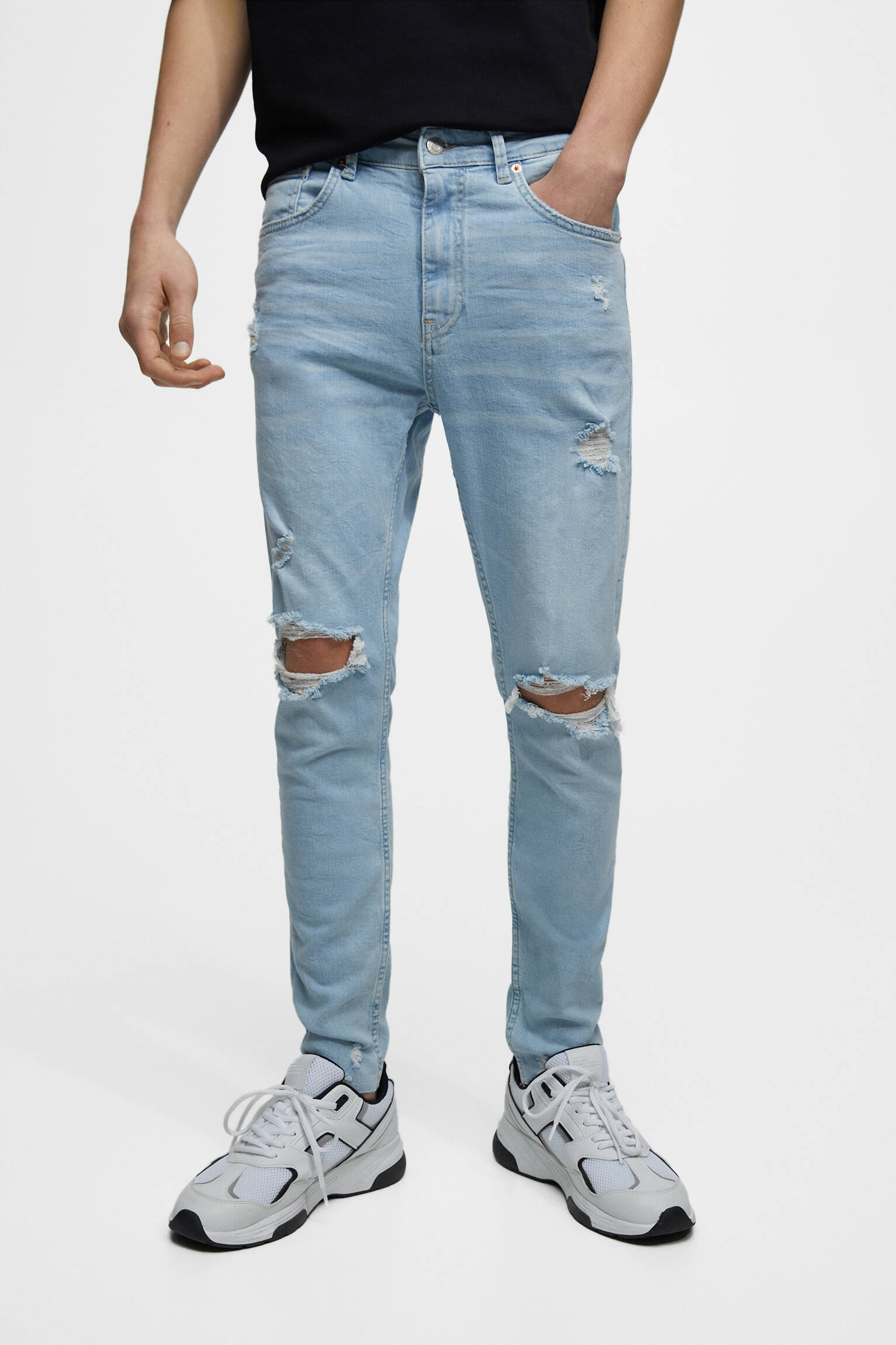 Calça jeans skinny com detalhes rasgados - azul claro