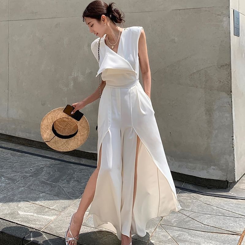 palajana - Mouwloze jumpsuit met split aan de voorkant
