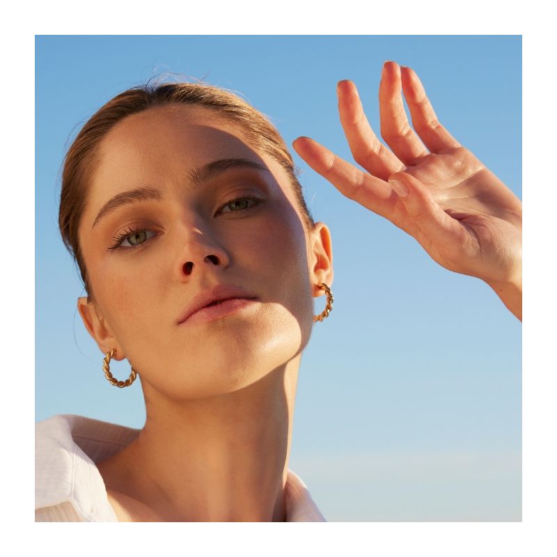 Crème solaire anti-rides Bronz Repair Sunkissed Solaire Fort hâle doré naturel Esthederm 50ml