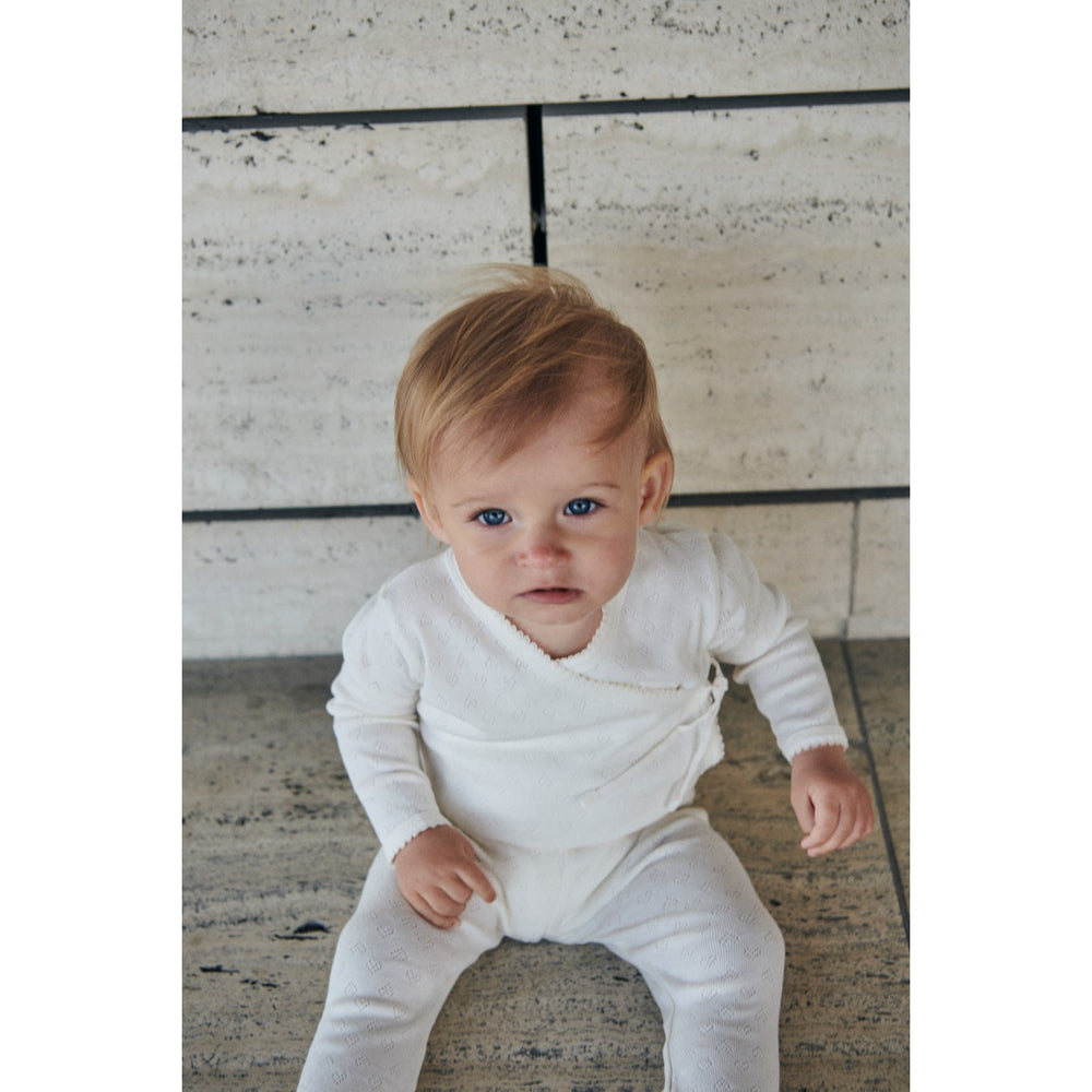 Køb COPENHAGEN COLORS Cream Pointelle Heart Crossover Body Ls