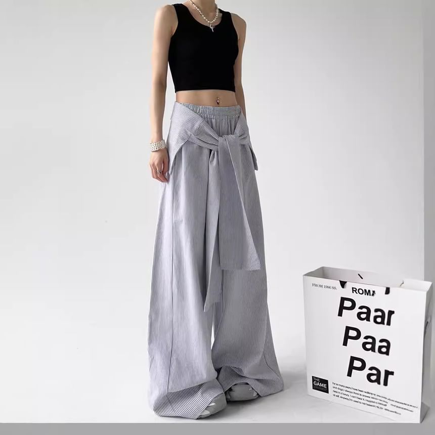 Rosesand - Gestreepte, losse, wijde broek met lage taille