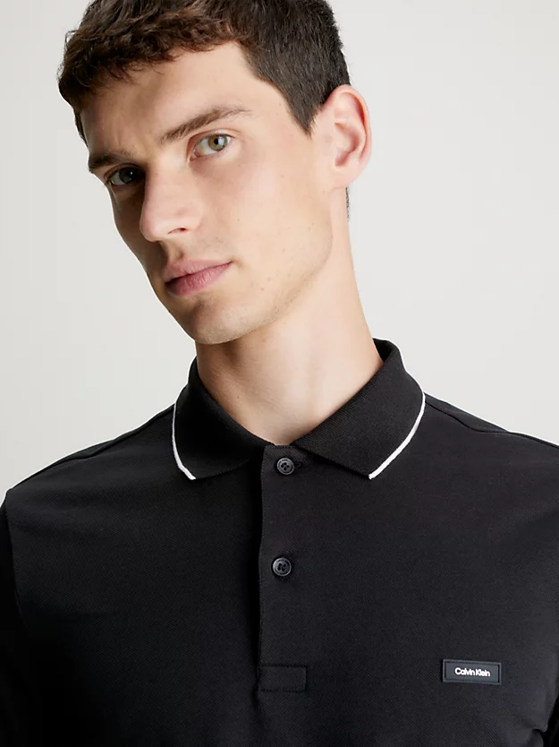 Camisa polo de piqué de manga comprida e corte justo