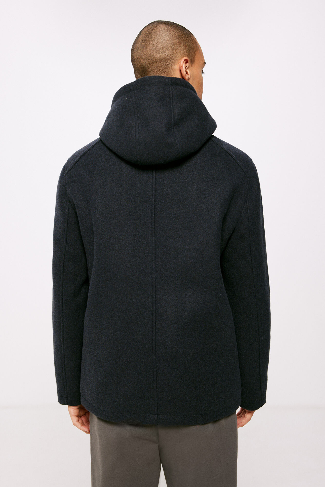 Parka com efeito lã e capuz.