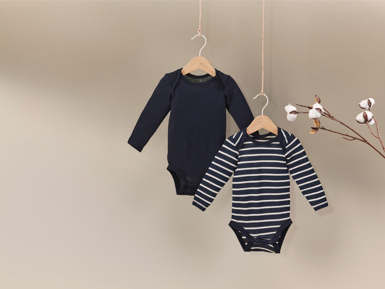 2 baby rompertjes