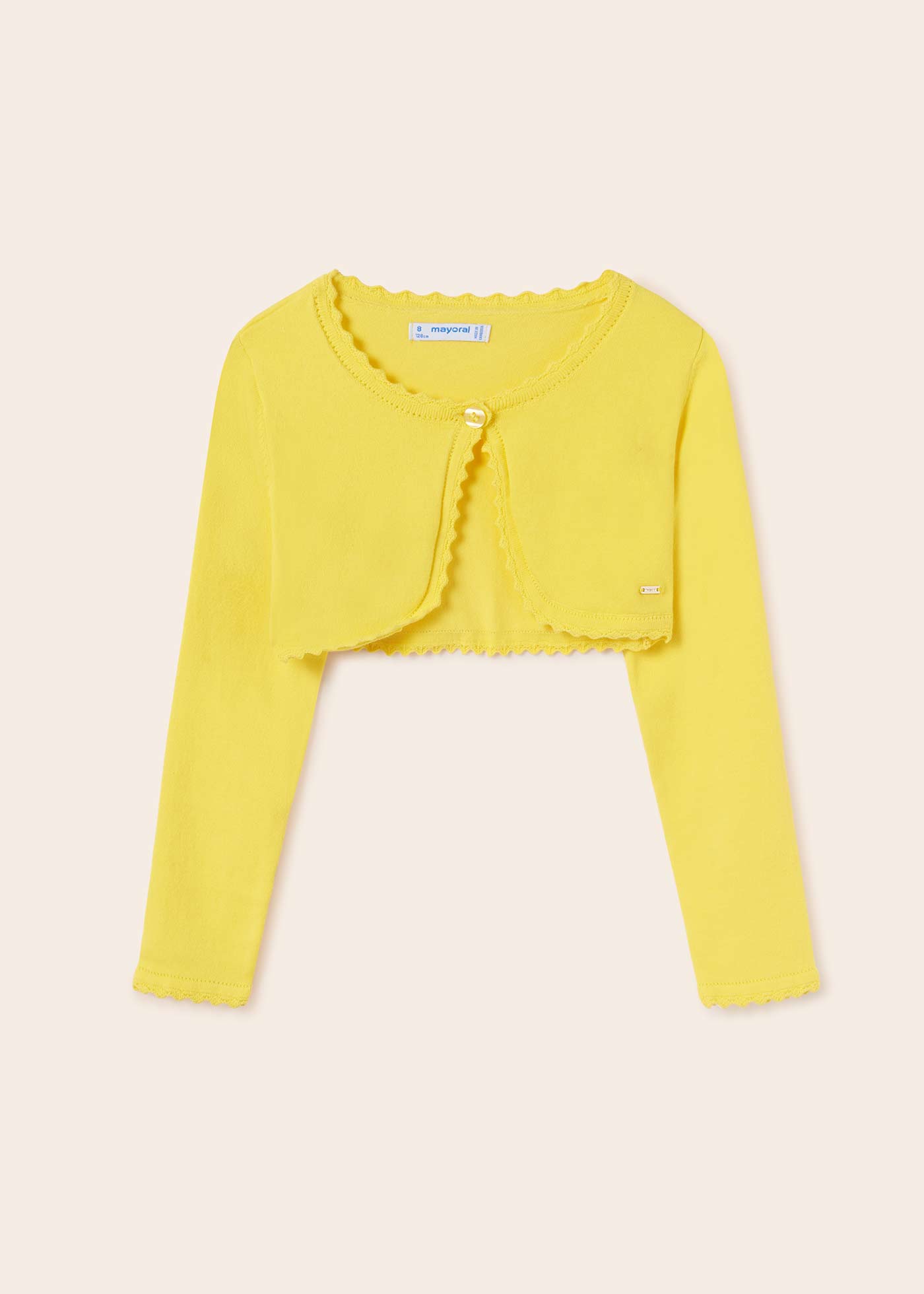 Casaquinho estilo bolero feito com algodão sustentável para meninas