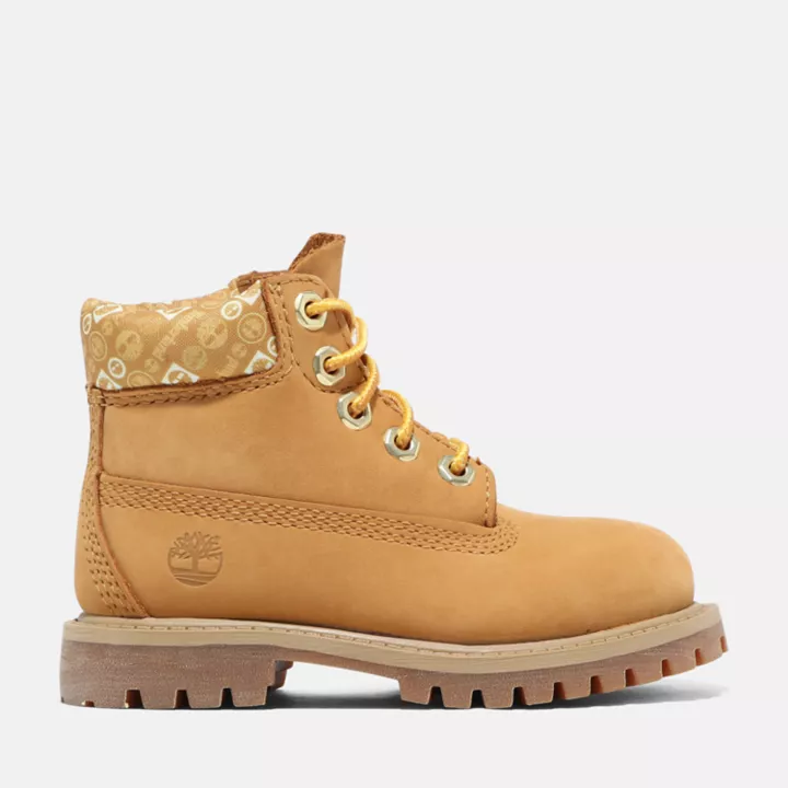 Bota infantil premium impermeável de 15 cm na cor amarela.