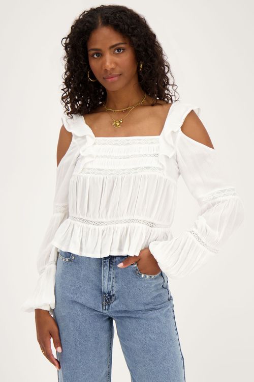 Witte top met lange mouwen met tapes en ruffles