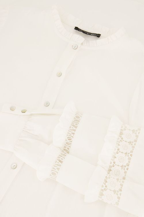 Witte blouse met kanten details