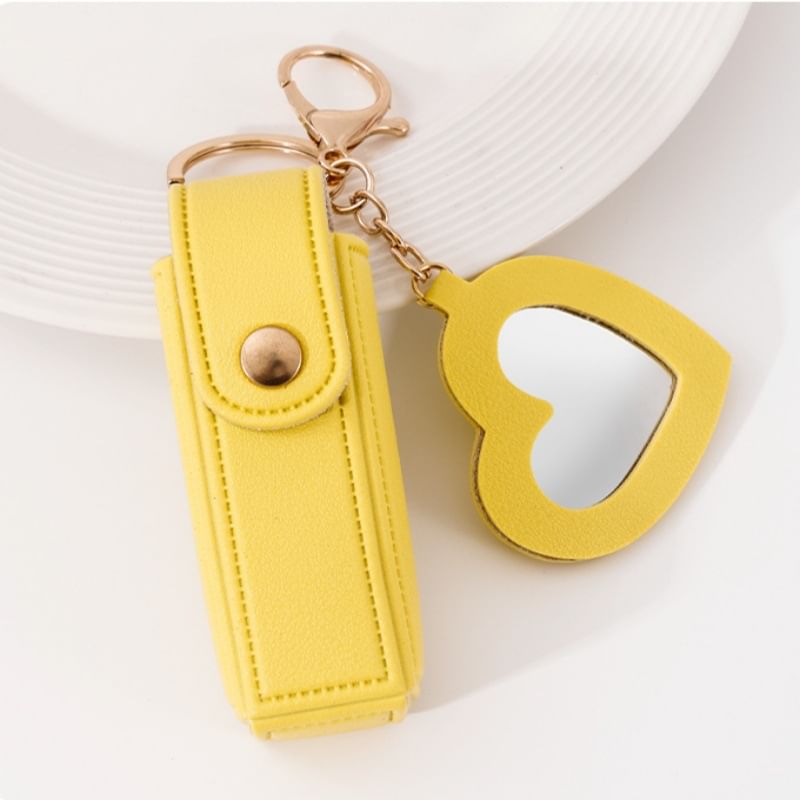 XIXI STUDIO - Hartvormige draagbare spiegel met lippenstift etui sleutelhanger