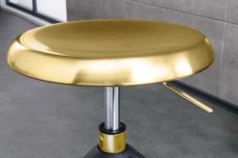 Höhenverstellbarer Barhocker INDUSTRIAL gold schwarz Metall rund drehbar Industrial Design